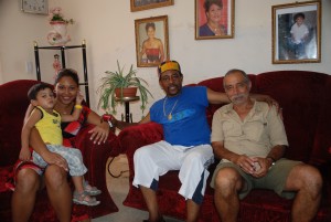 Mo Fini , Candido Fabre and his granson in his house in Manzanillo, Cuba